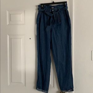 Soft denim elastic waist pants with belt.